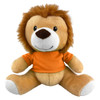 A lion plush toy with a fluffy mane and soft, tan body, wearing an orange shirt. It has a friendly expression and a logo.