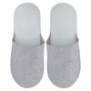 Felt slippers in light grey with a simple design and soft texture, featuring a logo on one slipper.