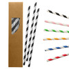 A box containing paper straws in black and white, with additional straws in various colours, including red, green, and pink.