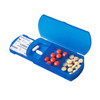 A blue travel pill box containing various tablets and capsules, with a compartmentalised design and a logo.
