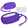 A purple silicone luggage tag with a white insert for personal information and a loop attachment.