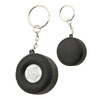A black tyre-shaped key ring with a silver centre, featuring a metal chain and keyring attachment.