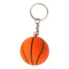 An orange basketball key ring with black detailing, attached to a silver metal keychain.