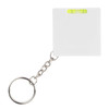 A white tape measure with a keyring and a small level attached to it.