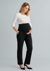 A pair of black maternity pants with a comfortable waistband, modelled by a woman wearing a white top.