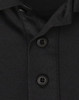 A black sustainable poly/cotton short sleeve polo shirt featuring a classic collar and button detail.