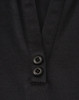 A black women's polo shirt featuring a v-neck and two buttons at the collar, made from sustainable poly/cotton blend.