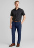 Men's comfort wool stretch slimline pant in navy blue, paired with a black shirt and brown belt. Features a logo.