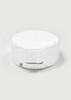 A white chef cap with a round shape and an elastic band at the back. It features a small logo tag.