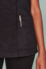 Black women's scrub top featuring a zip front and a side pocket with a pen holder.