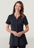 A women's black tunic featuring short sleeves, a button front, and two pockets. It has a logo.