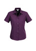 A purple short sleeve button-up shirt with a collared neckline and a fitted style, featuring a logo.