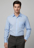 A blue long sleeve button-up shirt with a chest pocket, featuring a logo on the fabric.