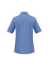 A blue women's overblouse with short sleeves and a collar, featuring a branded logo on the back.