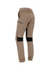 A pair of men's tan stretch work pants with cuffed hems and black accents. Features pockets and branded detailing.