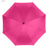 A hot pink golf umbrella with a black centre button, featuring eight panels and a sleek design.