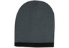 A two-tone cable knit beanie in grey with a black rim. It has a logo on one side.