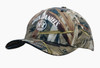 A camouflage cap featuring a full brim and a logo, predominantly in earthy tones of green, brown, and tan.