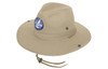 A beige cotton twill hat with a wide brim, featuring a logo on the front and a chin strap.