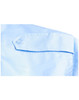 A light blue button-up shirt featuring an epaulette detail and a small logo on the shoulder.