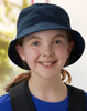 A navy soft washed bucket hat featuring eyelets, worn by a smiling child with a ponytail.