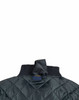 A dark green soft shell jacket with a quilted design and a ribbed collar, featuring a hanging loop at the back.