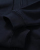 A men's full-zip fleecy hoodie in navy, featuring cuffed sleeves and a smooth fabric texture.