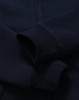 A navy blue kid's full-zip fleecy hoodie with a soft texture and cuffed sleeves. Features a logo.