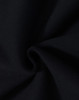 A close-up of black fabric with a soft texture, demonstrating a fleecy material suitable for hoodies.