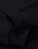 A black full-zip fleecy hoodie with a smooth fabric texture and a close-up view of the sleeve.