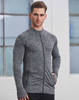 A man wearing a grey seamless jacket with a zip, featuring a fitted design and pockets.