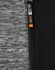 A close-up of a grey and black workwear jacket featuring a zipper and a logo.