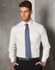 A men's long-sleeve button-up shirt in white with a pocket, paired with a dark tie and black trousers.