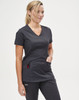 A solid black women's short-sleeve scrub top with a V-neck and side pockets, featuring a logo.