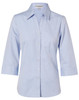 A light blue women's fine chambray shirt with 3/4 sleeves and a button-up front. Features a collar and a logo.
