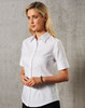 A white women's short-sleeve button-up shirt with a fitted silhouette. It has a collar and subtle branding.