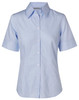 Light blue short-sleeved button-up shirt with a collar, featuring a logo on the chest.