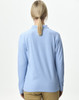 A light blue unisex long sleeve polo shirt featuring a collar and a logo on the back.