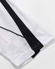 A white polo shirt featuring black detailing along the sleeves and a logo.