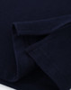 A navy ladies cotton stretch polo shirt, featuring folded sleeves and a smooth fabric texture. It has a logo.