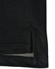 A black polo shirt featuring a textured fabric and side slit detail, also has a logo on it.