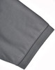 A grey polo shirt featuring a short sleeve with a neatly finished cuff and a logo.