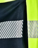 A navy jumper with reflective stripes and high visibility yellow accents, featuring a logo.