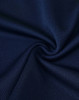 A close-up of navy blue Cooldry fabric with a textured finish, featuring a slight sheen and breathable design.