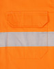 An orange long-sleeve shirt featuring perforated reflective tape and a back pocket. It has a logo on the fabric.