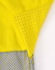 A bright yellow long-sleeve shirt with perforated grey fabric accents and reflective tape. Features a logo.