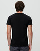 A black premium cotton t-shirt featuring a simple design and short sleeves, with a logo on the back.