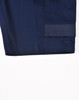 Navy blue unisex utility stretch cargo work shorts with a cuffed hem and branding.