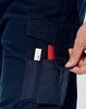 A pair of navy work pants with pockets, featuring red stitching and a hand reaching into a side pocket.