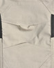 Light grey fabric of work pants featuring detailed stitching and black accents, with a logo present.